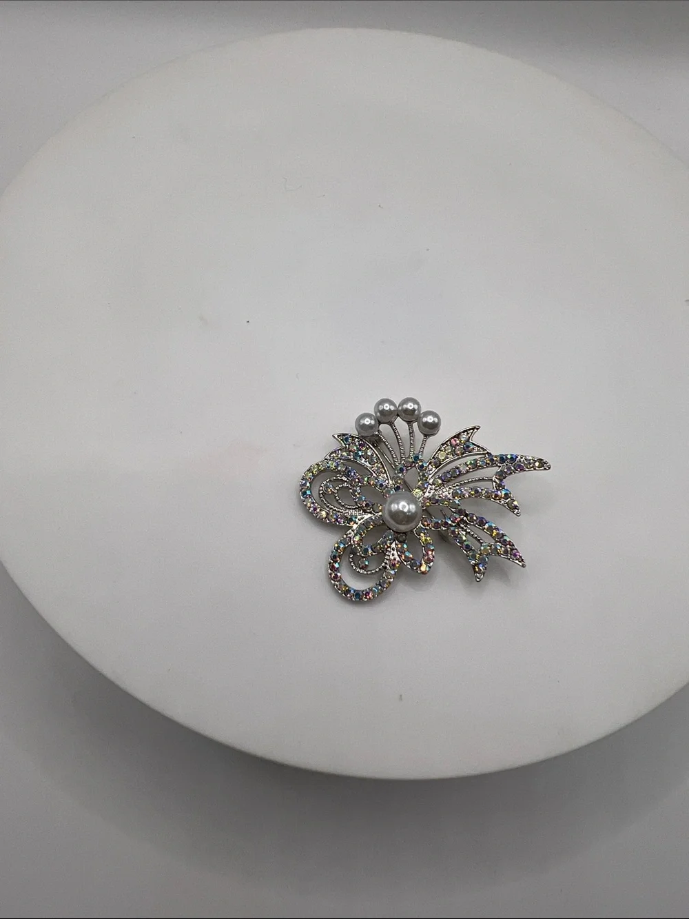 474. Silver Tone and Aurora Borealis Crystal Floral Brooch With Pearl Accents.